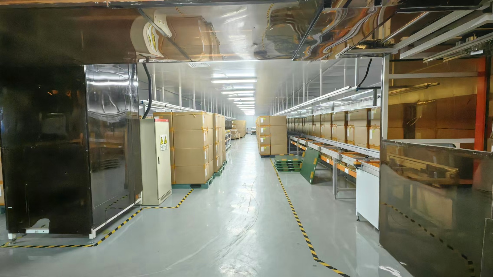 An assembly line on the Fudakin production floor, where molded, metal and sewn components come together.