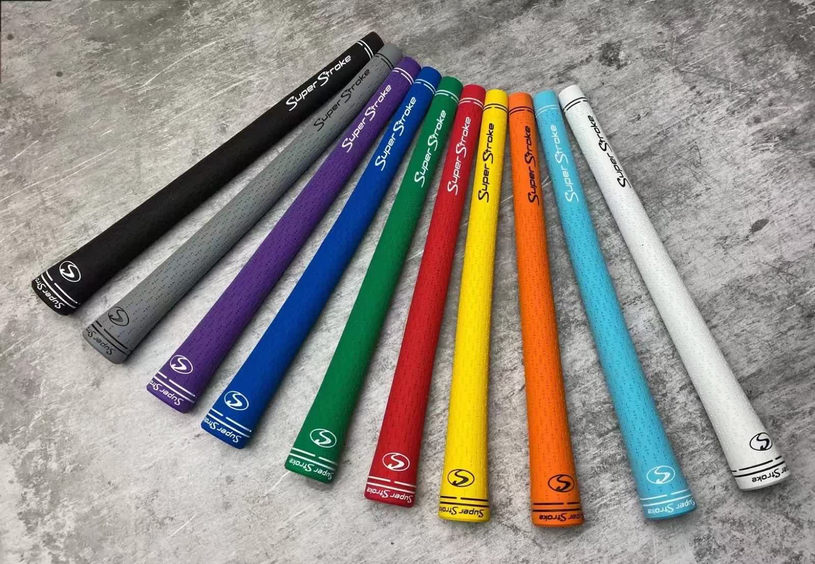 A row of molded golf putter grips, an example of soft-touch molding run on Fudakin's floor.
